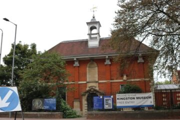 The brick exterior and entrance of Kingston Museum on Wheatfield Way